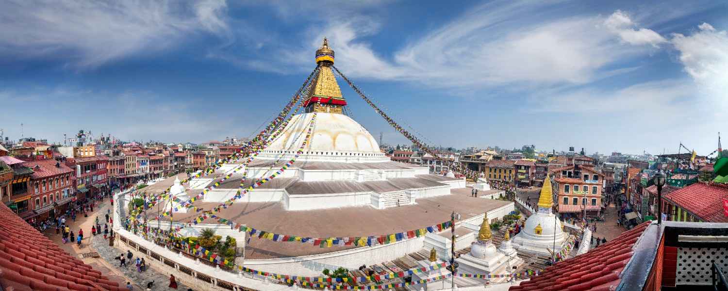 Boudhanath Stupa, a large Buddhist stupa in Kathmandu, Nepal, decorated with prayer flags