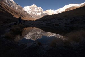 Machhapuchhre peak reflected in a mountain pool near Annapurna Base Camp
