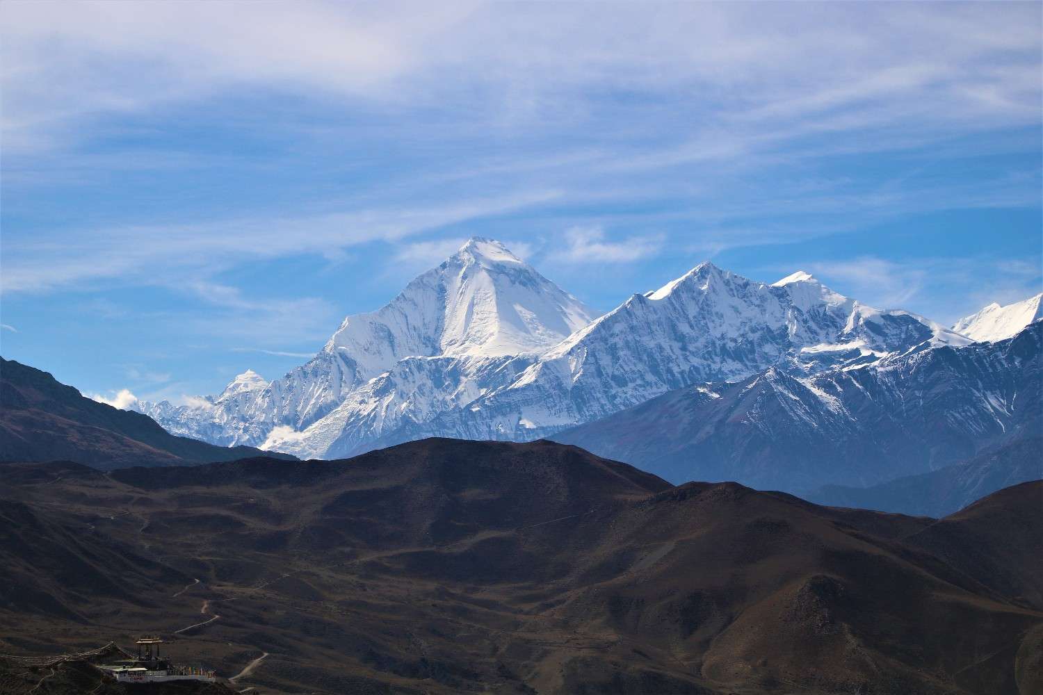 Dhaulagiri massif rising above arid Mustang hills